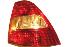 Фонарь задний правый Toyota Corolla E120/E130 (седан) дорестайлинг красно-жёлтый